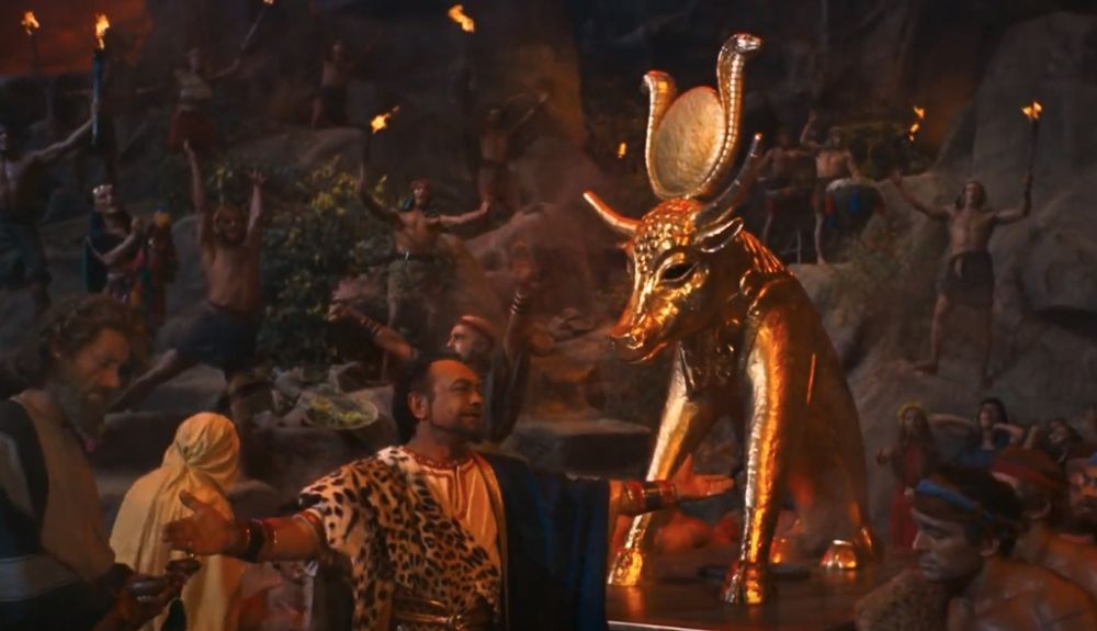 The Israelites worship the golden calf as an Idol.